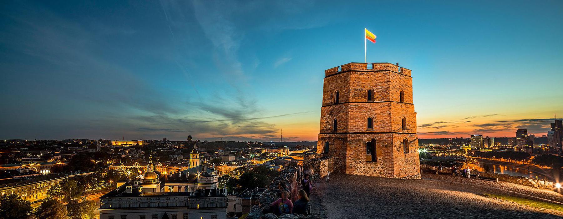 Nightime View Of Vilnius Lithuania With Gediminas Castle Tower