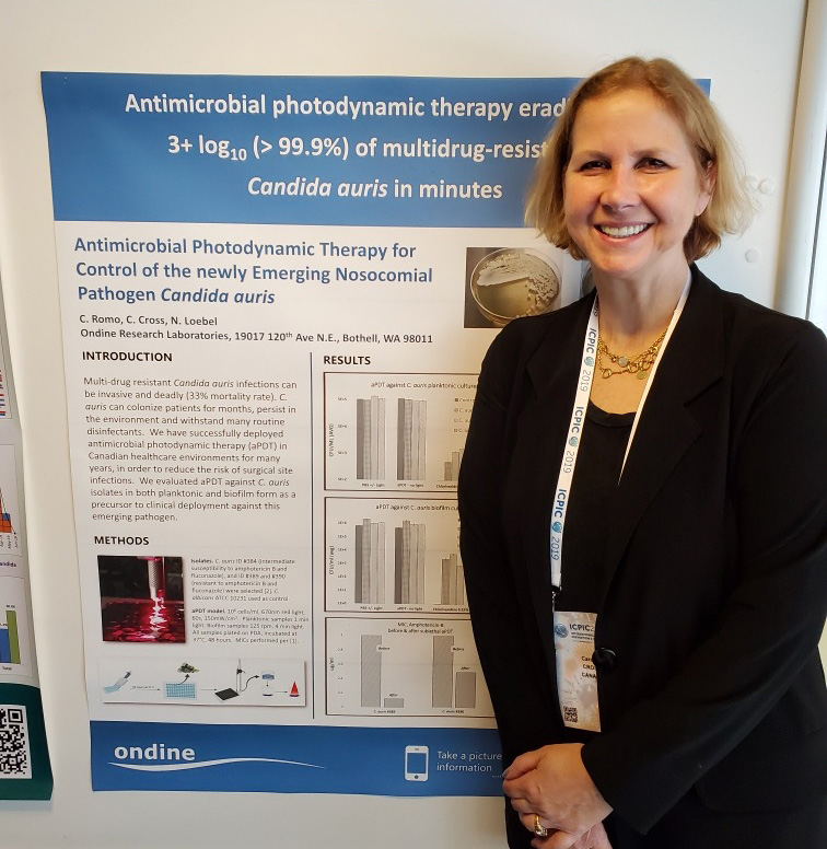 Carolyn Cross In Front Of Medical Poster
