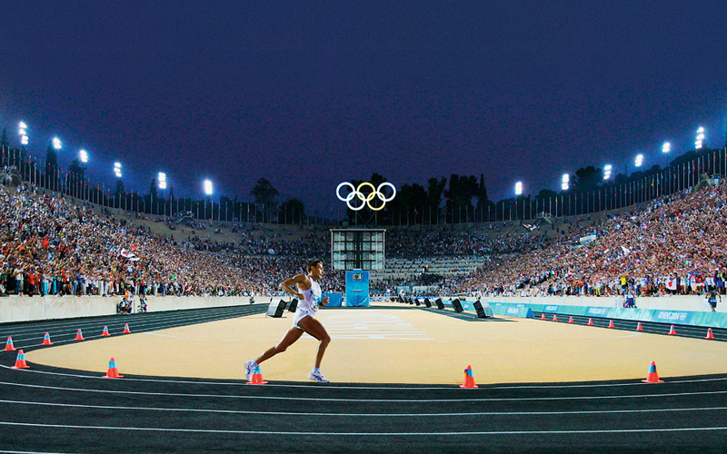 Olympics Runner On Track In Panathenaic Stadium Athens Greece