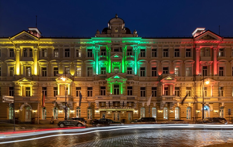 Front Facade Of The Grand Hotel Kempinski Vilnius Lithuania Illuminated At Night