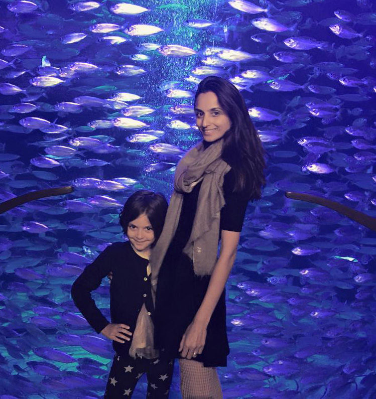Farzana Baduel With Daughter At Aquarium With Many Fish In The Background