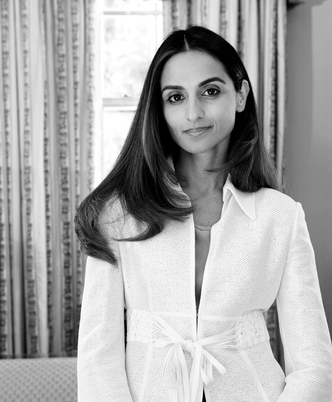 Black And White Corporate Photo Of Farzana Baduel In White Clothing