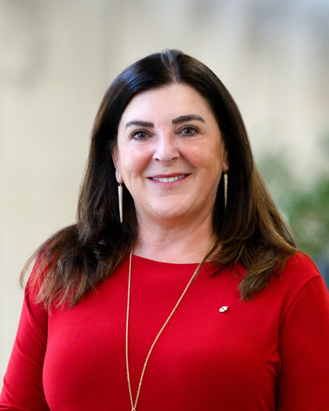 Corporate Photo Of Vianne Timmons Wearing Red Shirt